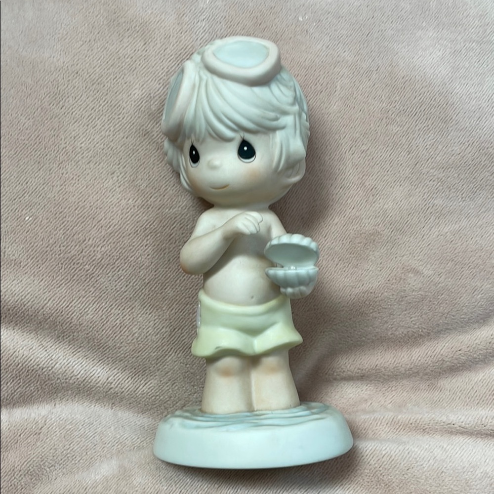 Adorable Precious Moments Figurine with Shell